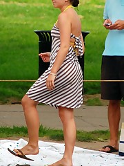 Upskirting. two ckicks in striped dresses