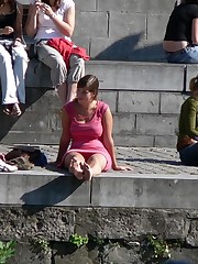 Busty chick voyeured in public. Up skirt sitting