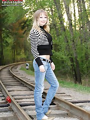 Real girl in jeans is staying on cam
