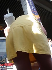 Yellow mini cannot save her from being voyeured. Up skirt celebrity upskirt