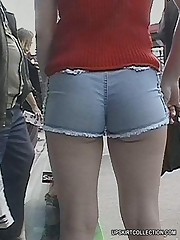 Camera guy spies bubble butts wrapped in tight shorts candid upskirt