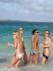 Sexy bikini girls getting suntanned bare titted candid upskirt