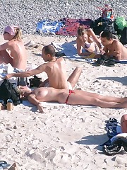 Sexy bikini girls getting suntanned bare titted upskirt pussy