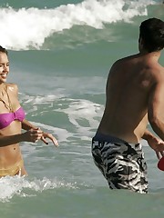 Bikini models entertain in the warm waves celebrity upskirt