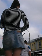 Charming dolls having their upskirt spied by guy with cam upskirt photo