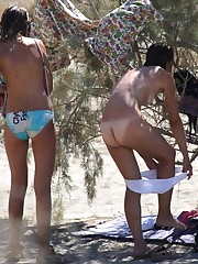 Topless women on the Koh PhanganA babe on open swim suit at the Bakers up skirt pic