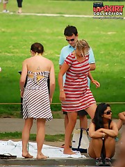 Upskirting. two ckicks in striped dresses teen upskirt