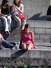 Busty chick voyeured in public. Up skirt sitting upskirt pic