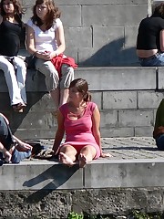 Busty chick voyeured in public. Up skirt sitting upskirt no panties