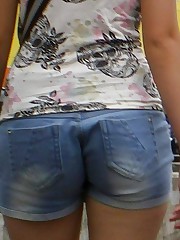 Girls in booty shorts spied on cam upskirt no panties