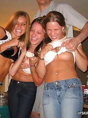 Saucy girls pull tight fitting jeans down