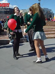 Schoolgirl upskirt - legal teen in green skirt spyed
