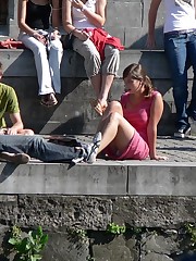 Busty chick voyeured in public. Up skirt sitting