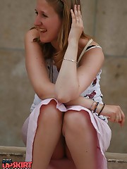 Sitting upskirt. Cutie voyeured in public place