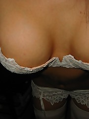 Girl in lingerie showing cameltoe and big boobs