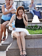 Girls pose so that upskirt were seen